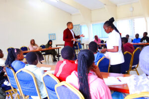 George Nthale Kisinga among other mentors giving career guidance to students